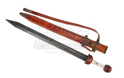 Lot #293 - GLADIATOR (2000) - General Maximus' (Russell Crowe) Stunt Roman Sword and Scabbard