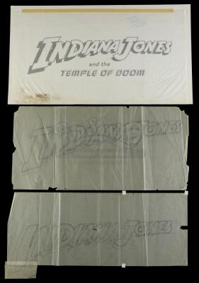 Lot #361 - INDIANA JONES AND THE TEMPLE OF DOOM (1984) - Two Hand-Drawn and One Printed Title Card Lettering Illustrations