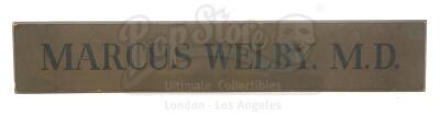 Lot #469 - MARCUS WELBY, M.D. (T.V. SERIES, 1969-1976) - Marcus Welby's (Robert Young) Name Plate