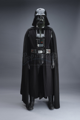 Lot #672 - STAR WARS: A NEW HOPE (1977) - 1977/1978 Darth Vader Promotional Costume With Poster-Matched Helmet