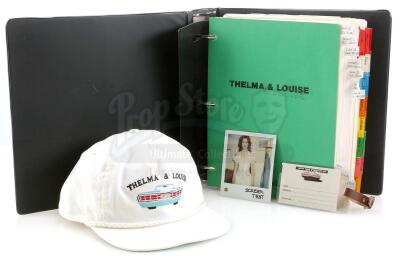 Lot #802 - THELMA & LOUISE (1991) - Production Binder, Geena Davis Screen Test Polaroid, Suitcase Tag and Hat Crew Gifts