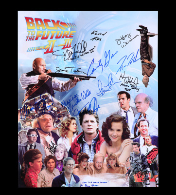 Lot #28 - BACK TO THE FUTURE TRILOGY (1985-1990) - Michael J. Fox, Christopher Lloyd, and Cast-autographed Poster