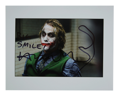 Lot #469 - THE DARK KNIGHT (2008) - Heath Ledger-autographed Joker Interrogation Photo