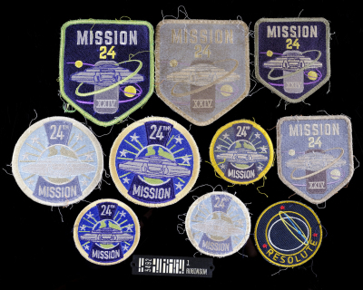 Lot # 60: Lost In Space (2018-2021) - Judy Robinson (Taylor Russell) Name Badge and Patches